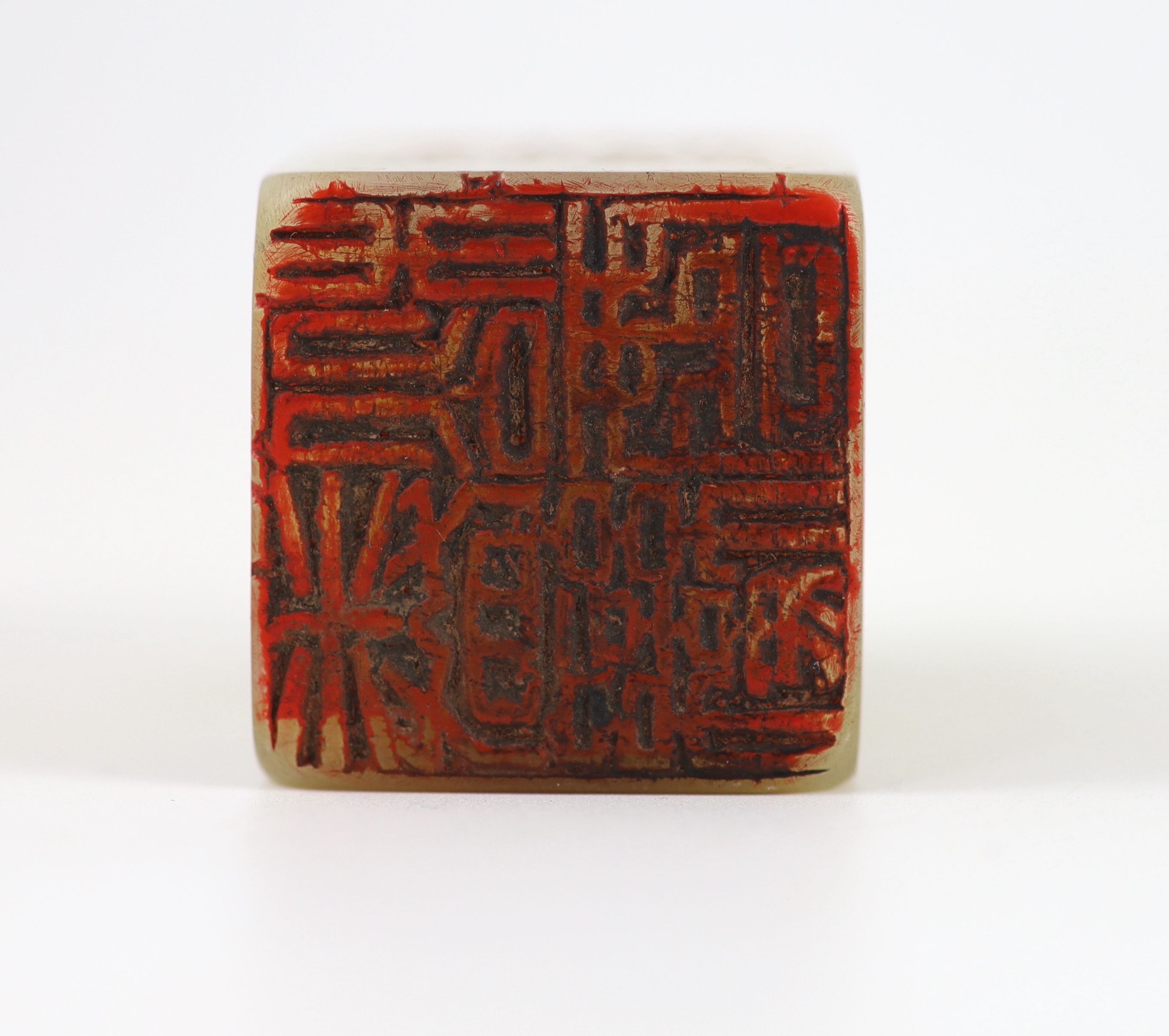 A Chinese cream and russet soapstone square seal, 5.2 cm high